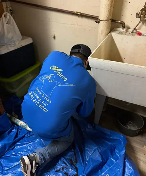 Removal of cast iron sink line and replace with pvc and clean out installation in Seattle 